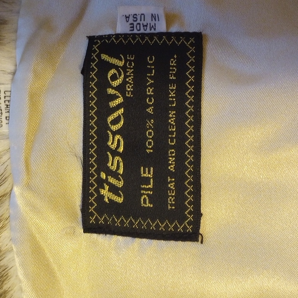 Tissavel fur coat